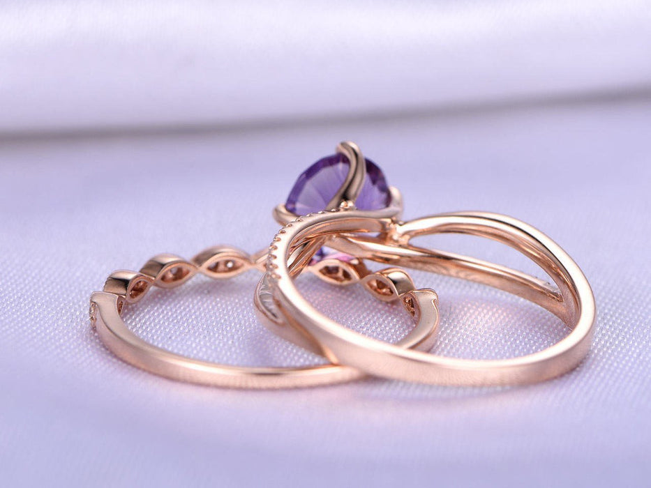 1.50 Carat Round Amethyst and Diamond Twisted Migraine Engagement Ring in Rose Gold