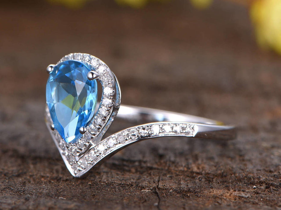 1.50 Carat Pear Cut London Blue Topaz Deco Curved Engagement Ring in White Gold