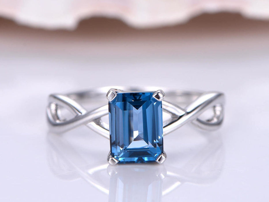 1.25 Carat Emerald Cut London Blue Topaz Solitaire Engagement Ring in White Gold