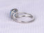 1.50 Carat Oval Sky Topaz and Diamond Split Shank Engagement Ring in White Gold