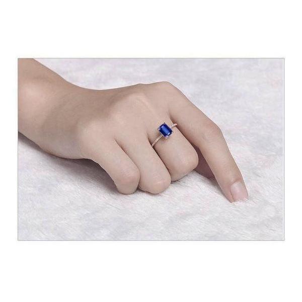 Limited Time Sale: 1.25 Carat Emerald Cut Blue Sapphire and Diamond Engagement Ring
