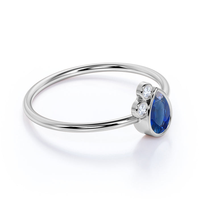 Unique Bezel Set Pear Cut Sapphire and Diamond Stacking Ring in White Gold
