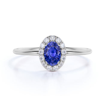 Classic 0.48 Carat Halo Set Oval Cut Sapphire and Diamond Dainty Ring in White Gold