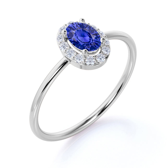 Classic 0.48 Carat Halo Set Oval Cut Sapphire and Diamond Dainty Ring in White Gold