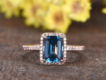1.50 Carat Emerald Cut London Blue Topaz and Diamond Halo Half Infinity Engagement Ring in Rose Gold