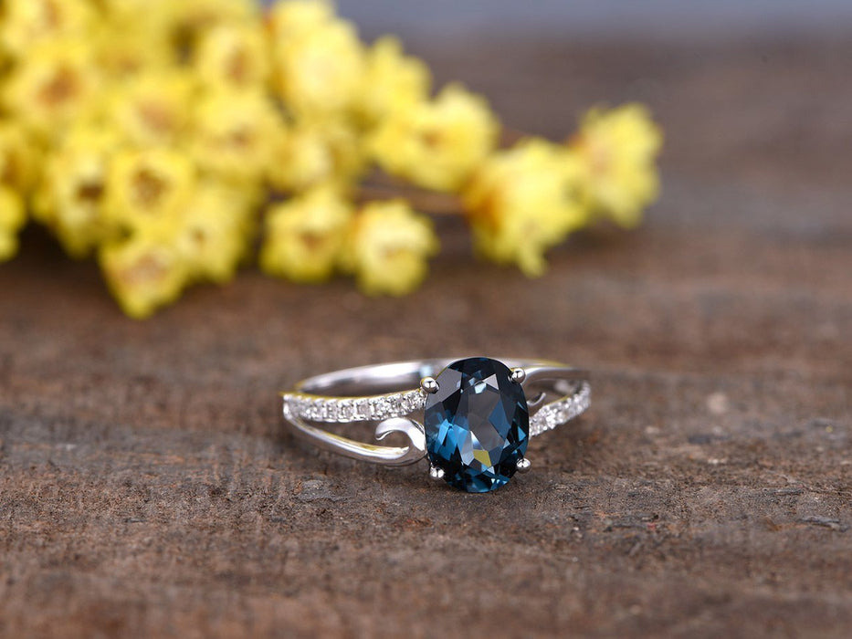 1.25 Carat Oval London Blue Topaz and Diamond Curved Split Shank Engagement Ring in White Gold