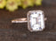 2 Carat Emerald Cut White Topaz and Diamond Halo Half Infinity Engagement Ring in Rose Gold