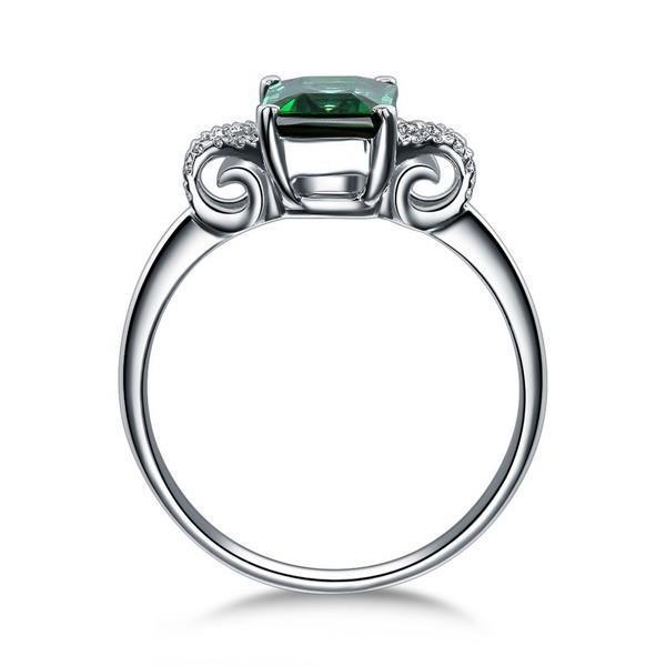 Unique 1.50 Carat Emerald and Diamond Infinity Engagement Ring