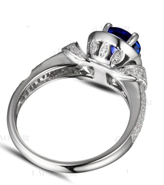 Vintage 1.50 Carat Round Cut Blue Sapphire and Diamond Art Nouveau Engagement Ring